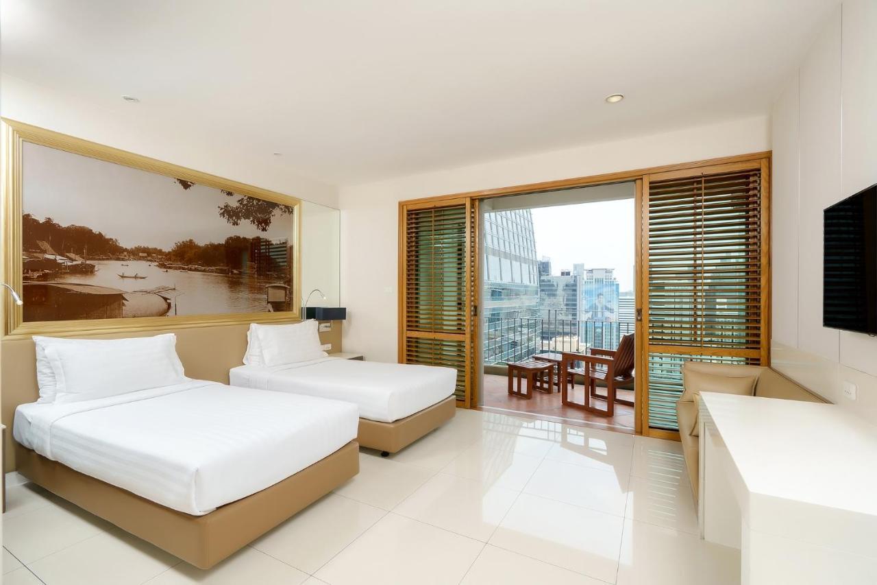 Отель Grande Centre Point Ploenchit Бангкок Экстерьер фото Deluxe Room