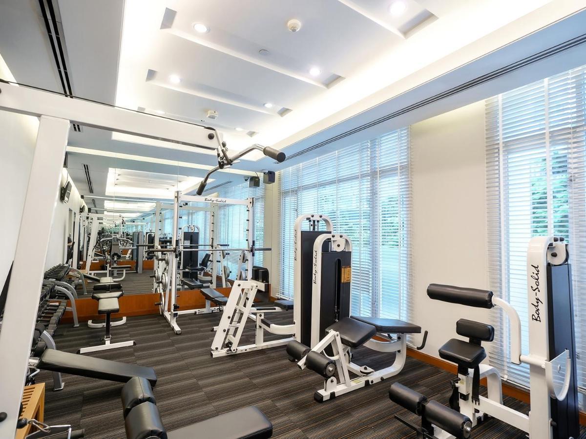 Отель Grande Centre Point Ploenchit Бангкок Экстерьер фото The gym at the hotel
